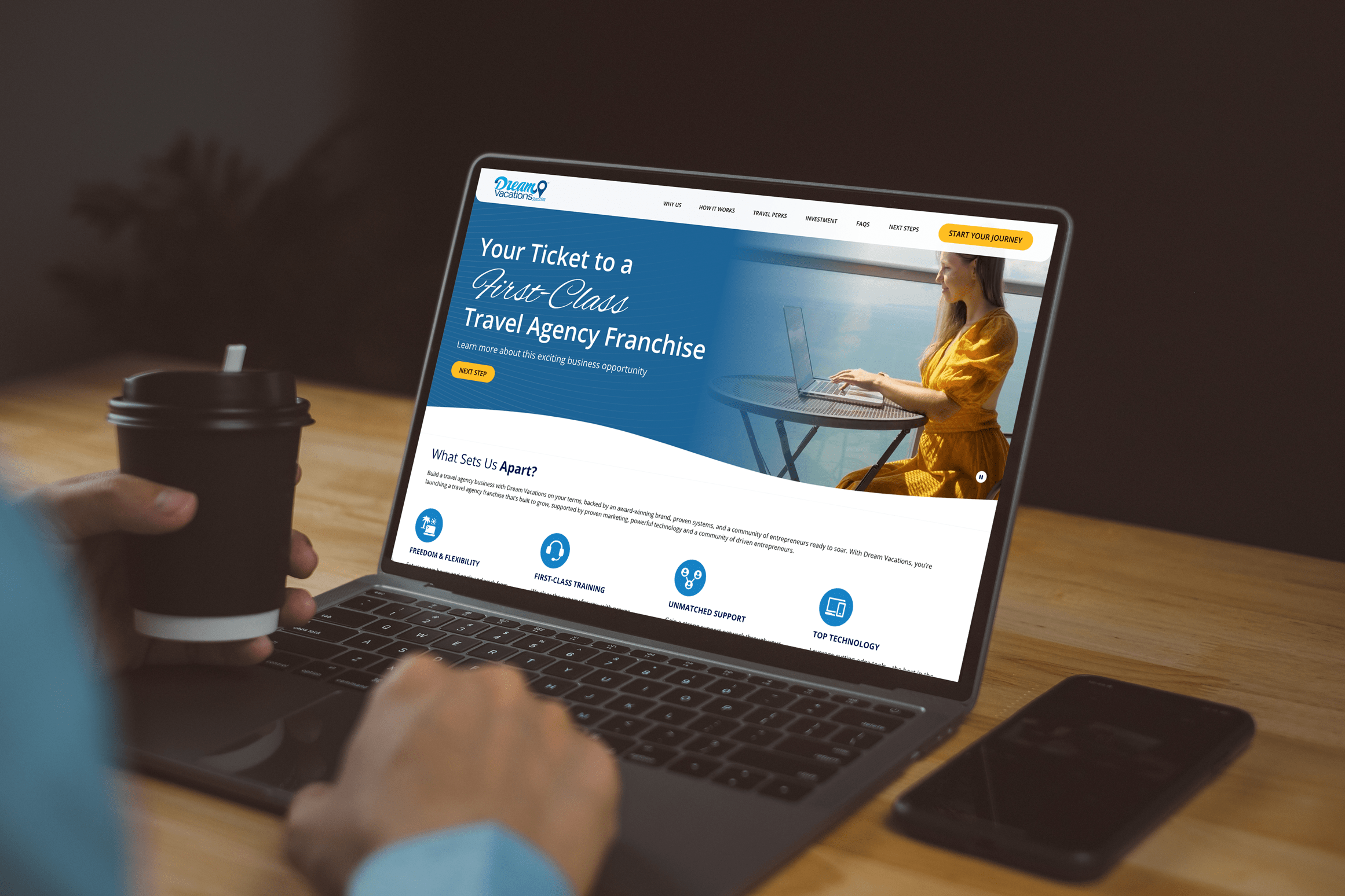 A person viewing the Dream Vacations Franchise homepage on their laptop